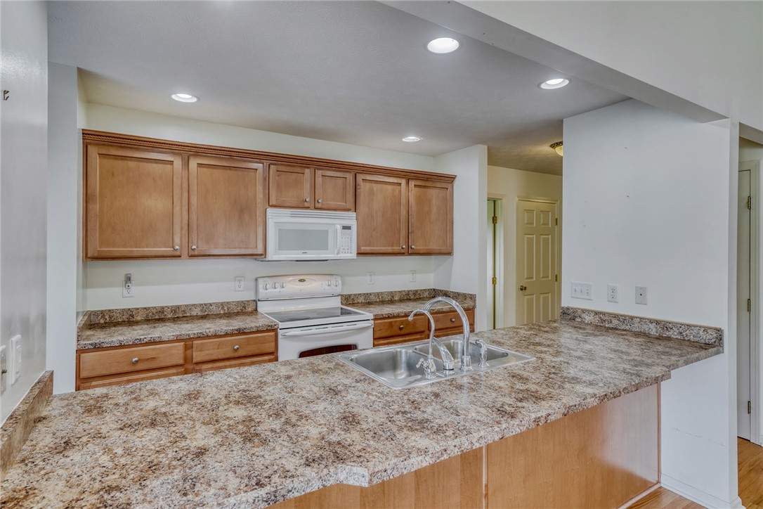 200 Rayfield Circle Webster, NY 14580 - Photo 21 of 41 KITCHEN W/QUALITY MAPLE CABINETRY