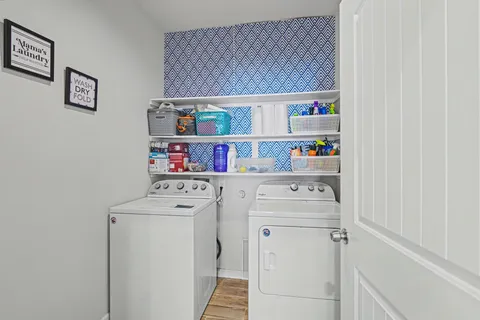 a utility room with dryer and washer