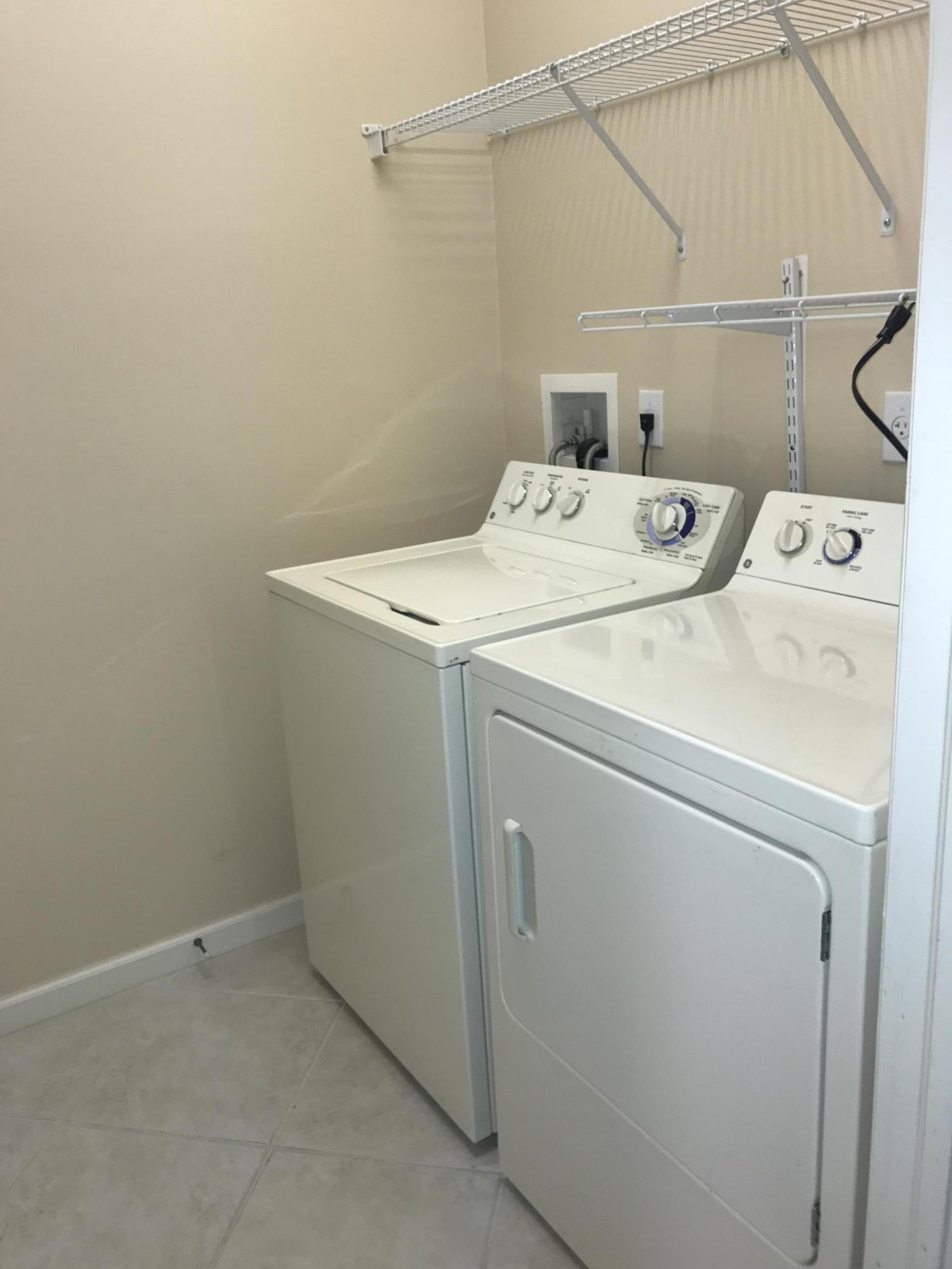 328 Springview Loop Port St. Lucie, FL 34986 - Photo 19 of 25 Laundry room