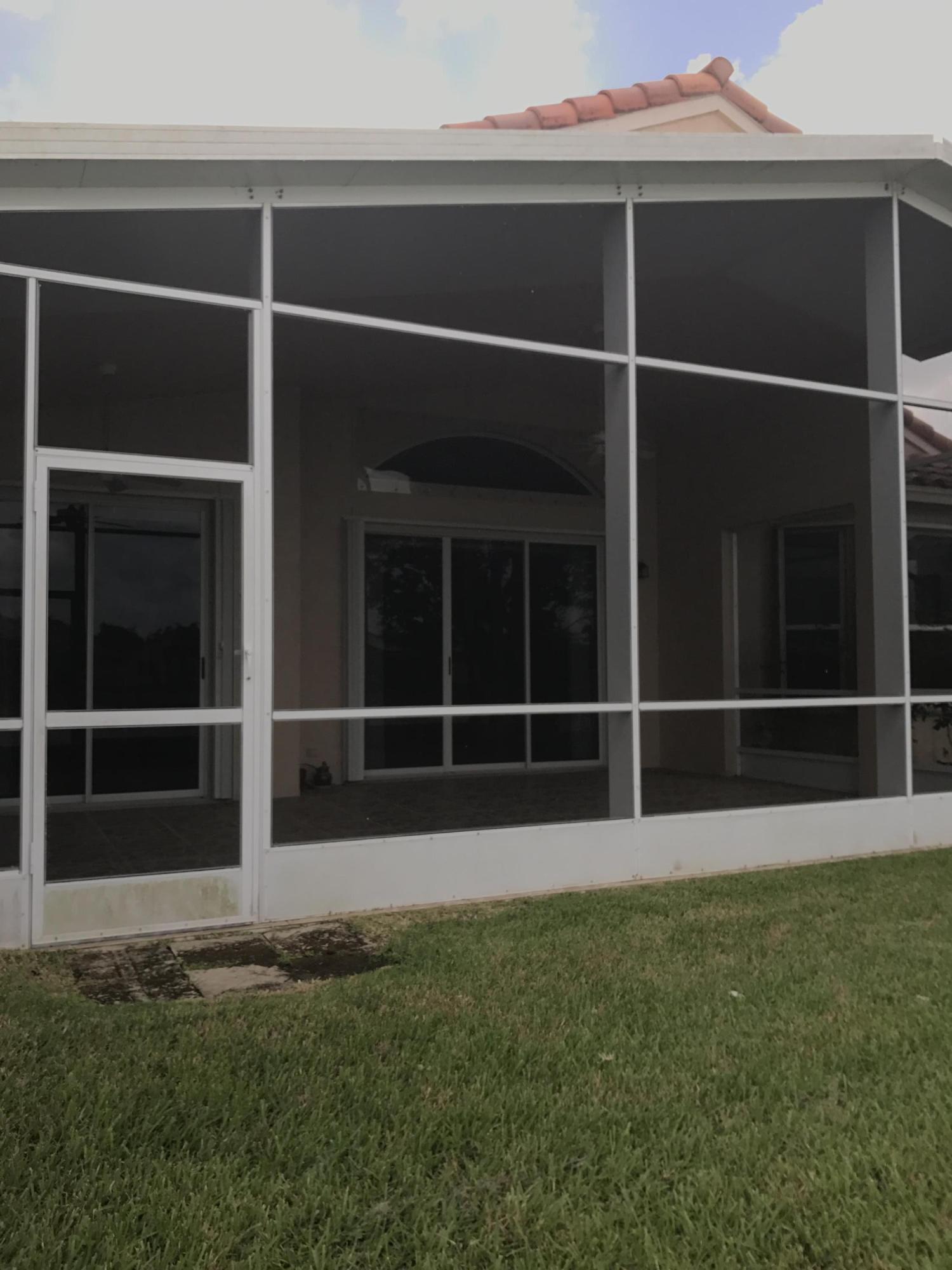 328 Springview Loop Port St. Lucie, FL 34986 - Photo 25 of 25 View of house from yard