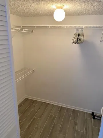 a view of a room with racks on the wall