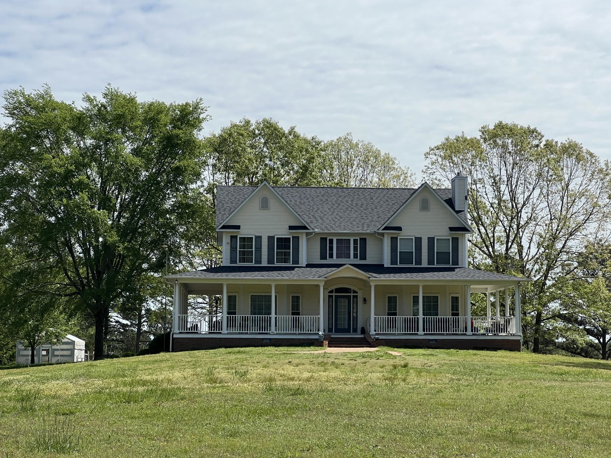 751 Bullman Road Finger, TN 38334 - Photo 1 of 22 a front view of a house with a garden
