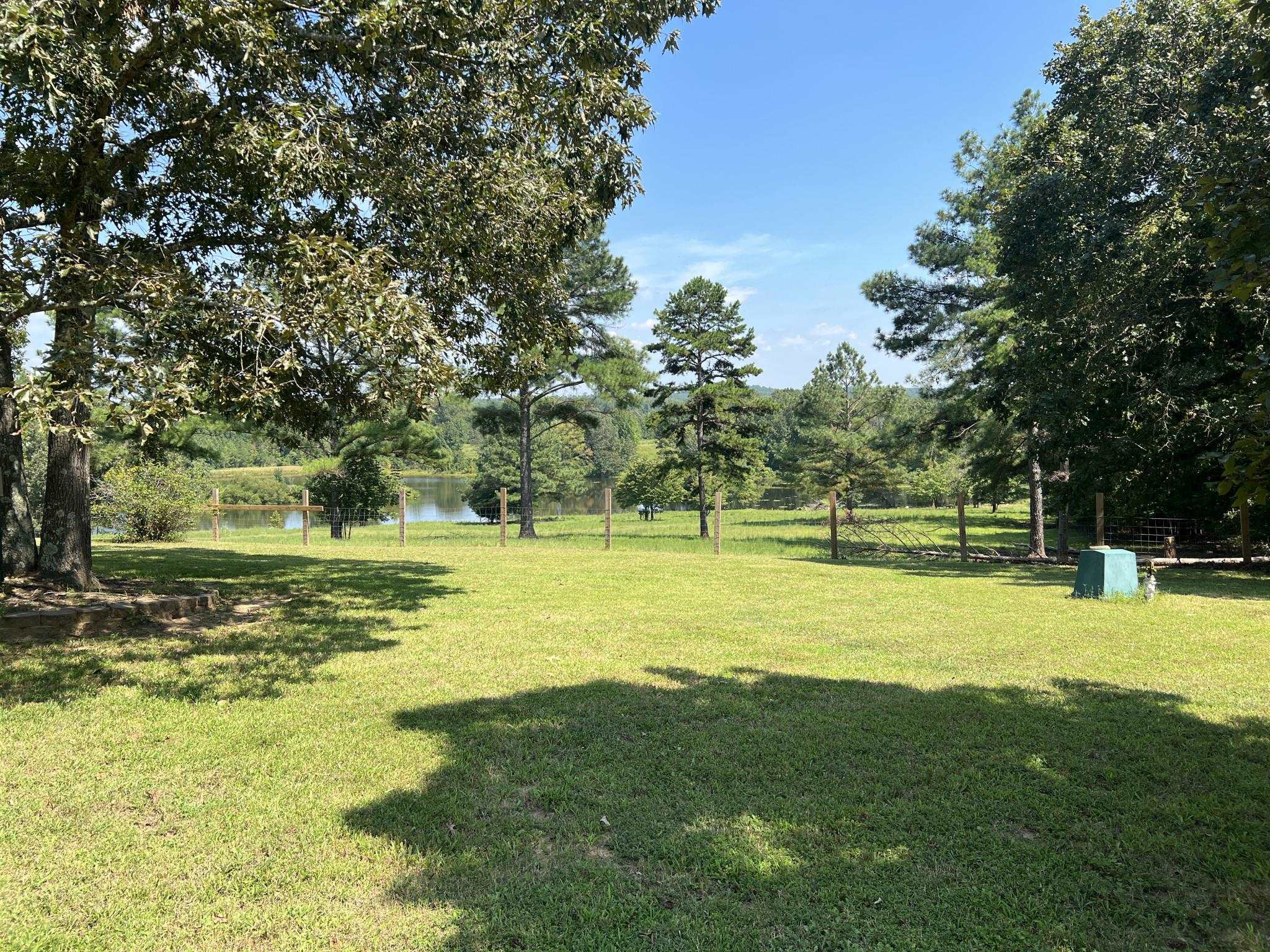 751 Bullman Road Finger, TN 38334 - Photo 15 of 22 a view of a swimming pool with a big yard