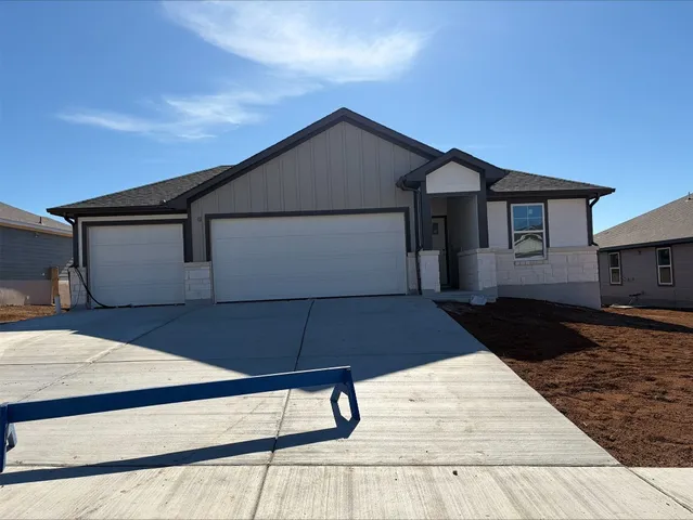 a house view with a backyard space