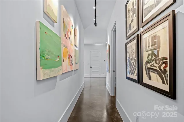 a view of a hallway with entryway