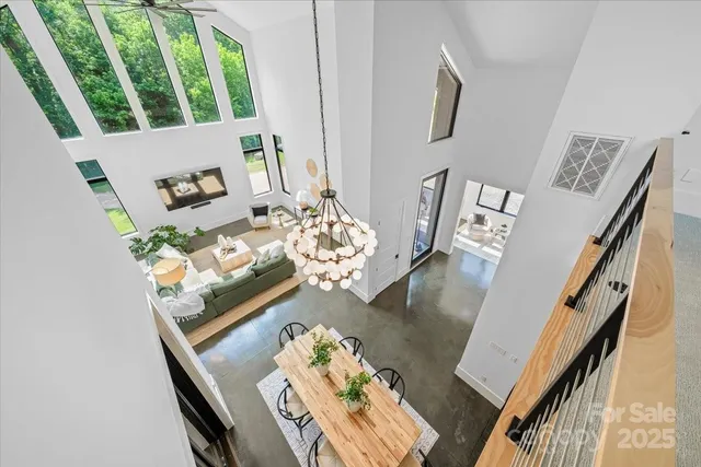 a view of living room with furniture and a large window