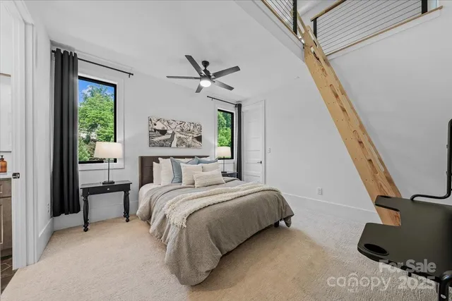 a bedroom with a bed furniture and a window