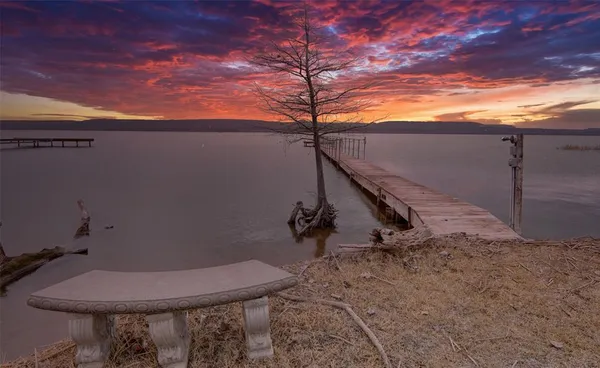 a view of a balcony with chairs