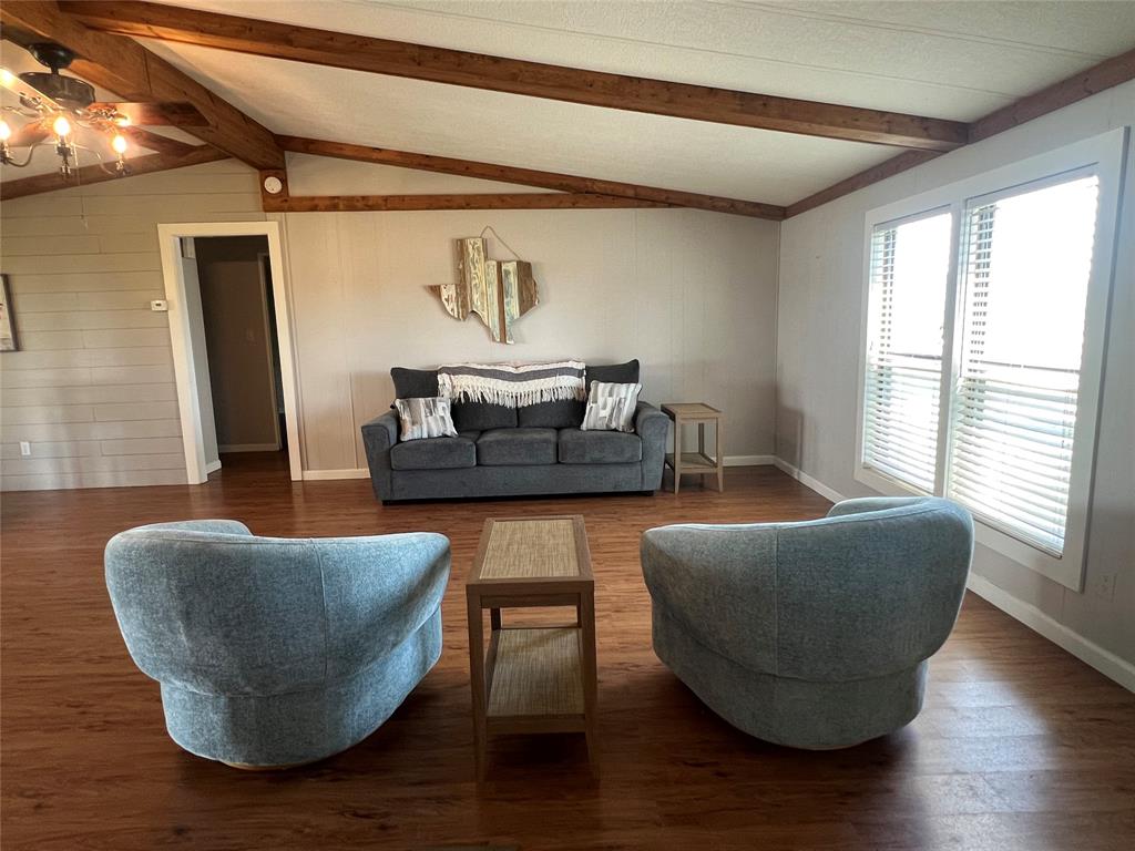 1059 Airport Road Graford, TX 76449 - Photo 5 of 35 a living room with furniture and a large window