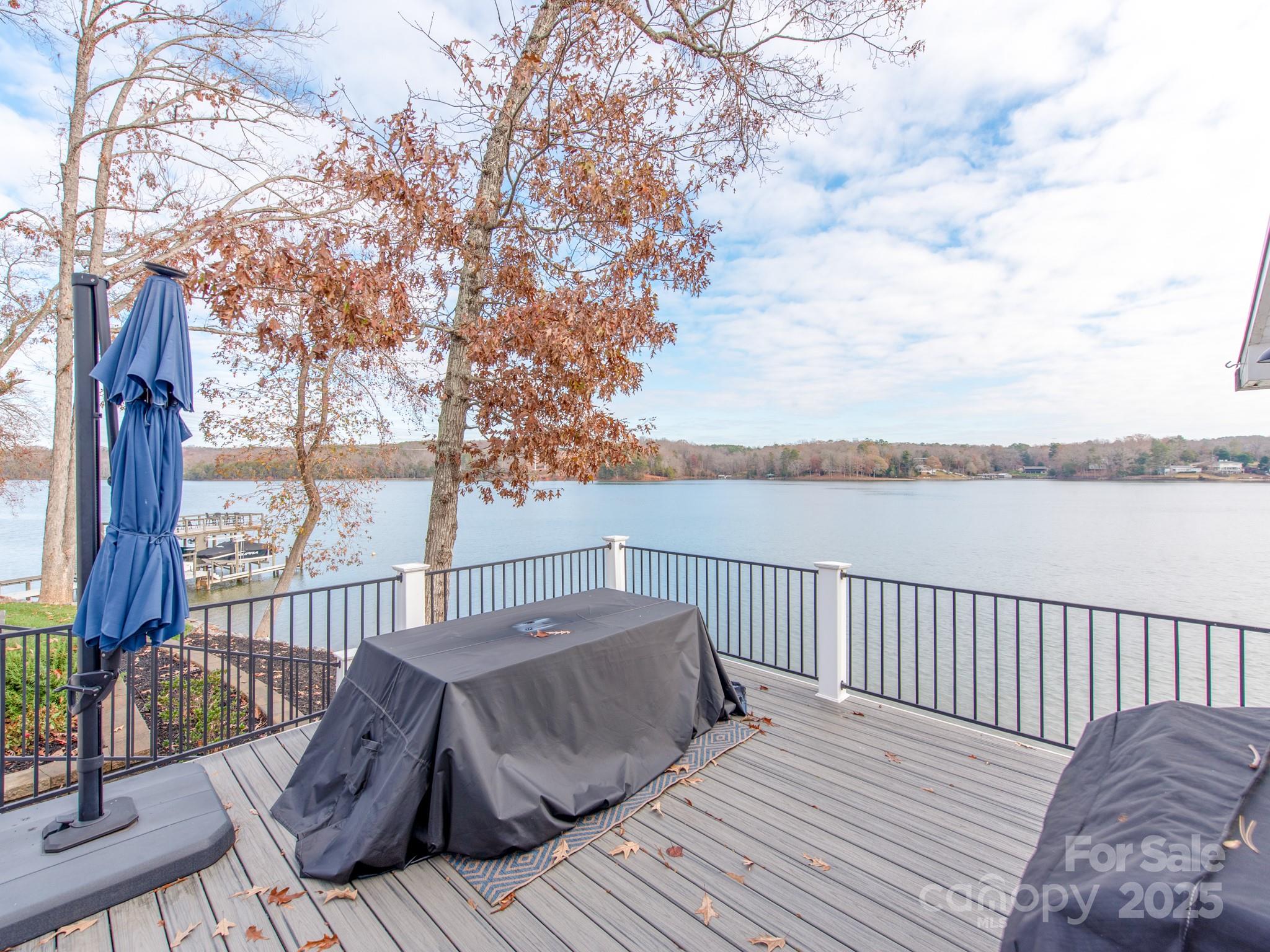 6788 Bucleigh Road Lake Wylie, SC 29710 - Photo 11 of 45 a view of balcony with wooden floor and fence