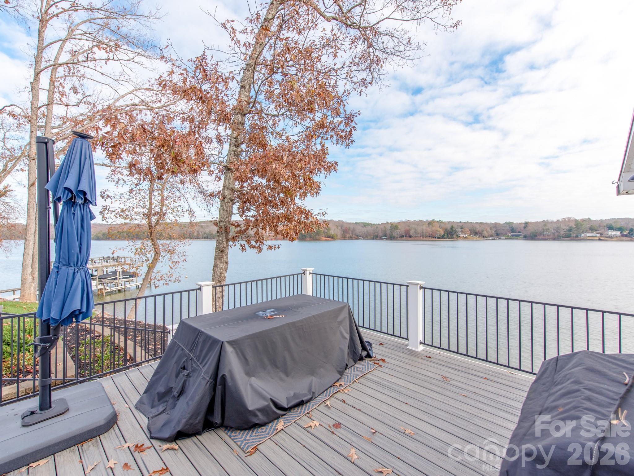 6788 Bucleigh Road Lake Wylie, SC 29710 - Photo 14 of 45 a view of balcony with wooden floor and fence