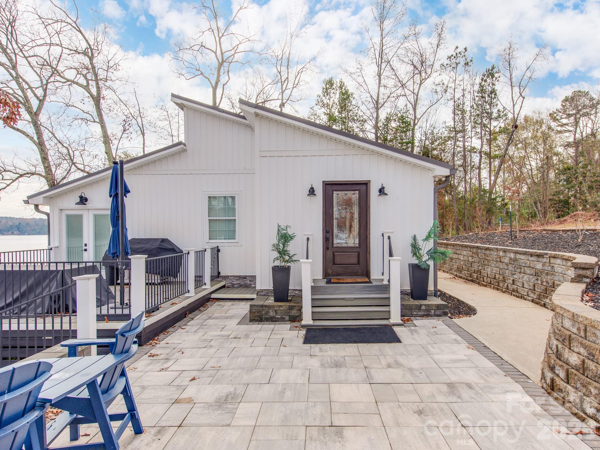 6788 Bucleigh Road Lake Wylie, SC 29710 - Photo 15 of 45 a view of a house with backyard and wooden fence