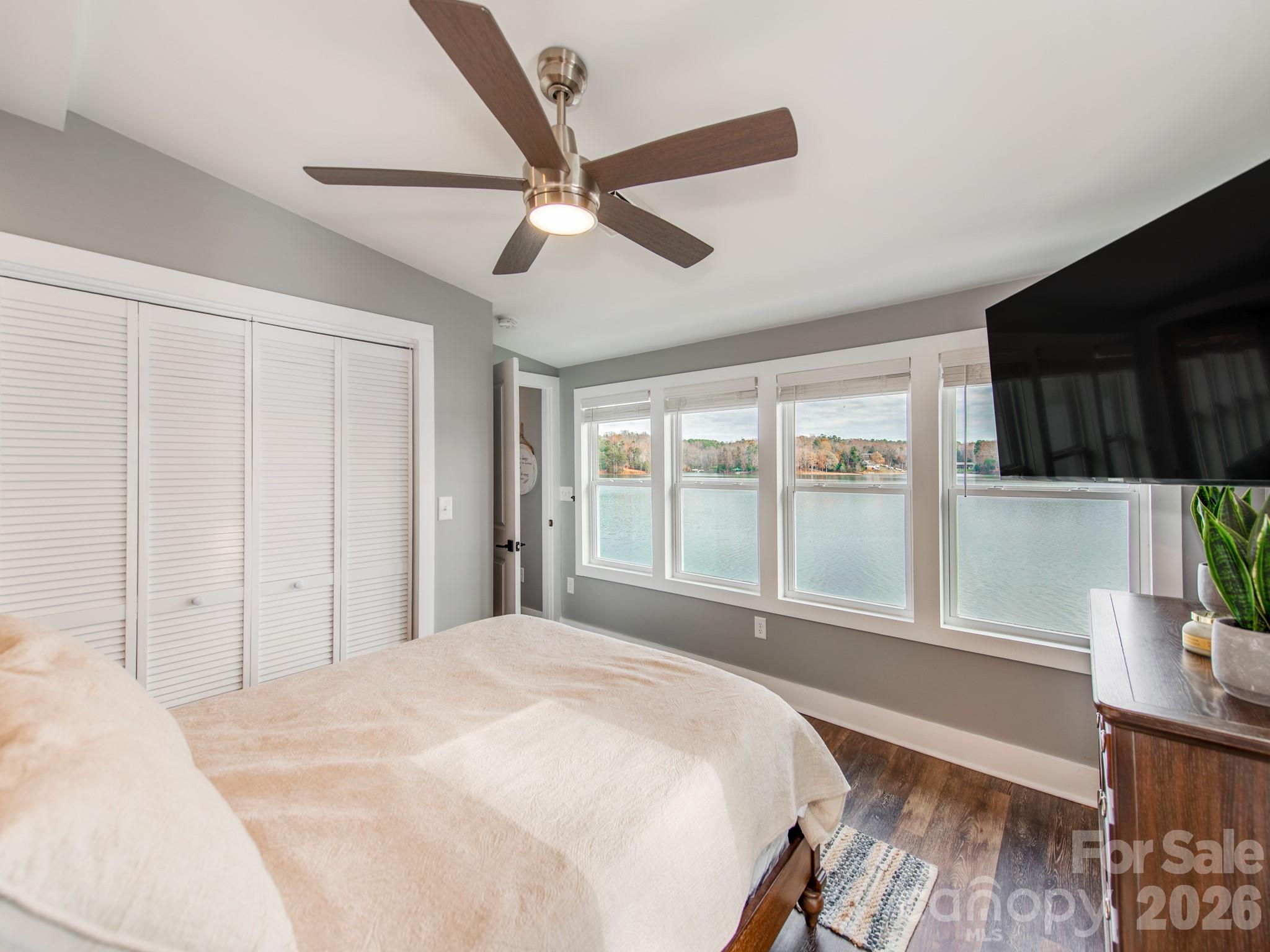 6788 Bucleigh Road Lake Wylie, SC 29710 - Photo 24 of 45 a bedroom with a large bed and a window