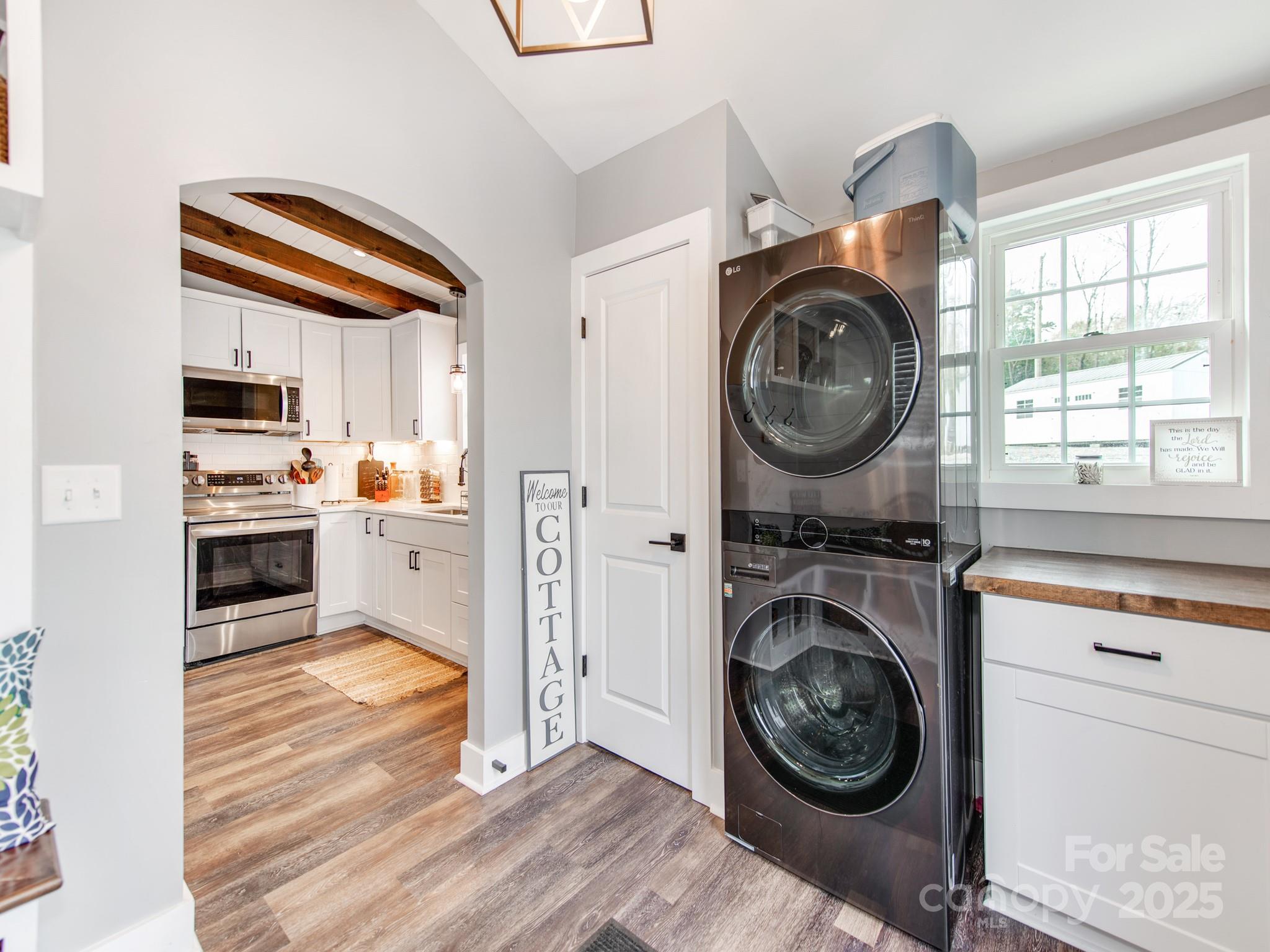 6788 Bucleigh Road Lake Wylie, SC 29710 - Photo 29 of 45 a view of kitchen sink and washer dryer