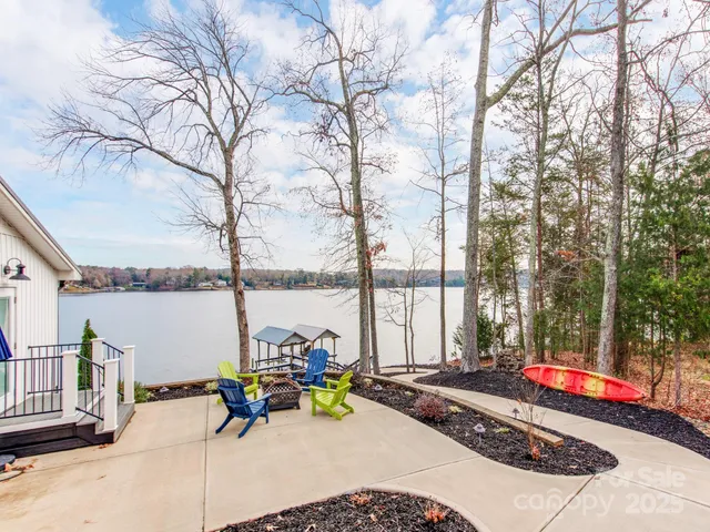 a view of a lake with a large trees