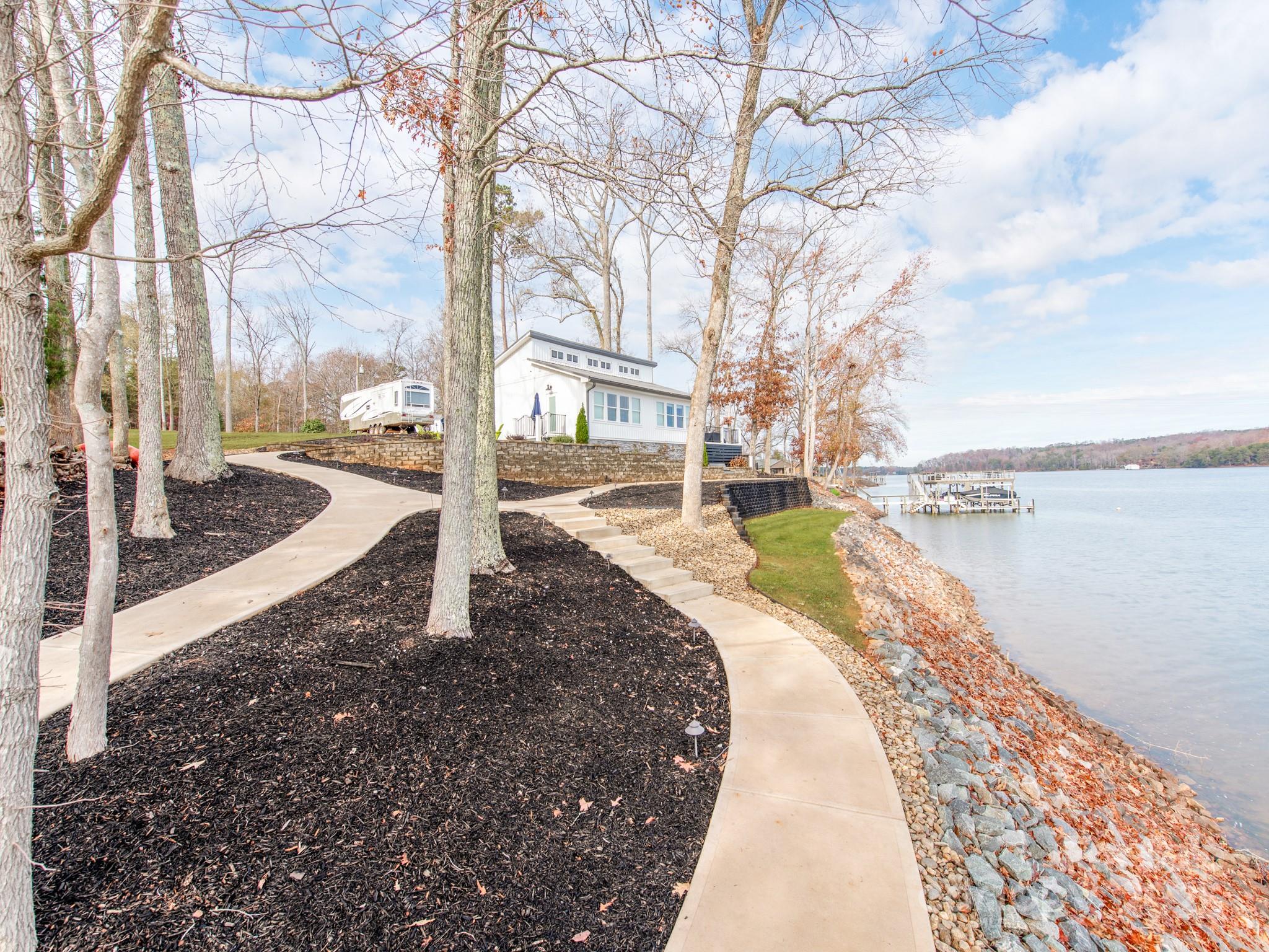 6788 Bucleigh Road Lake Wylie, SC 29710 - Photo 35 of 45 a view of a yard with swimming pool