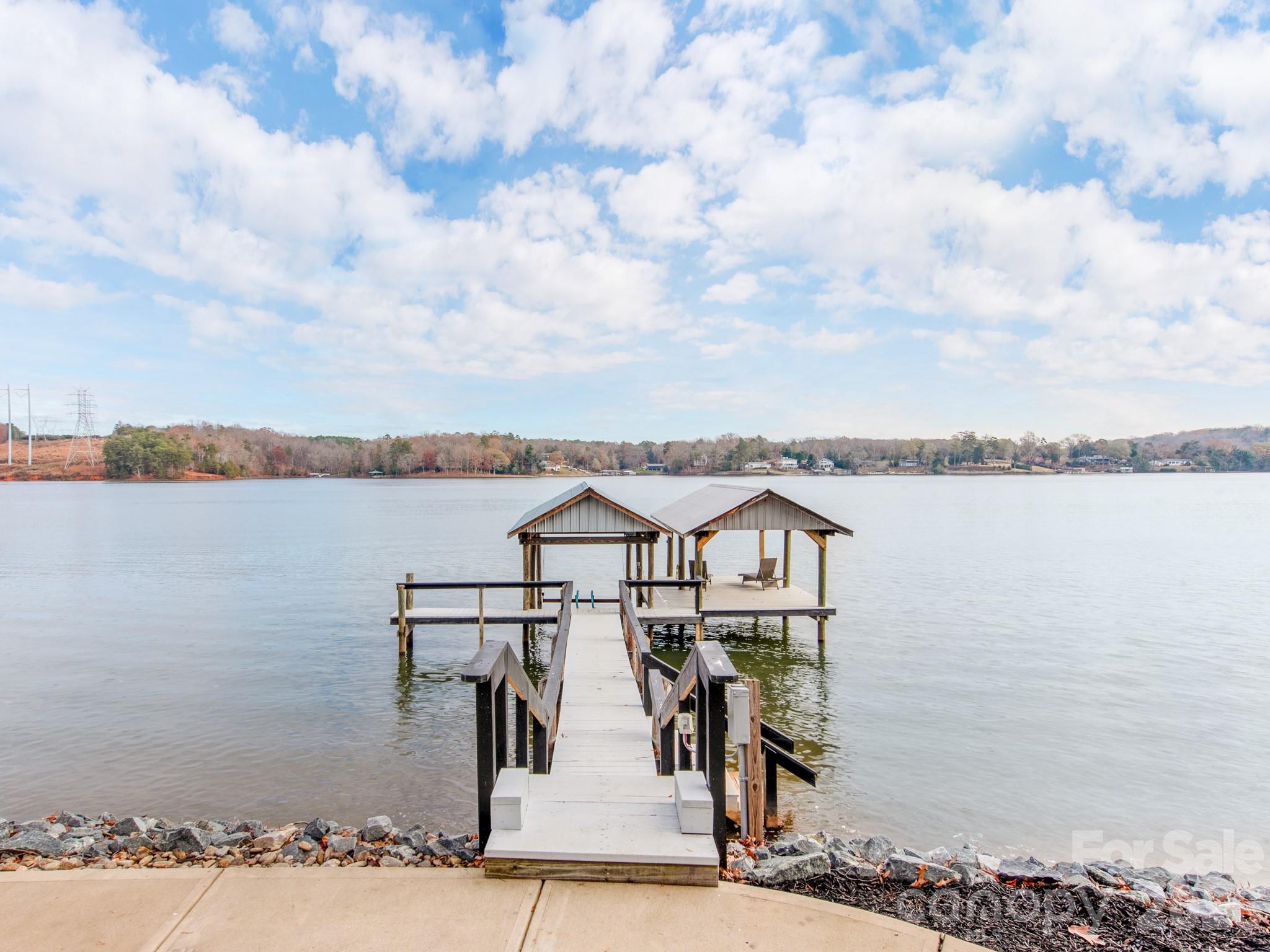 6788 Bucleigh Road Lake Wylie, SC 29710 - Photo 4 of 45 a view of a lake and city