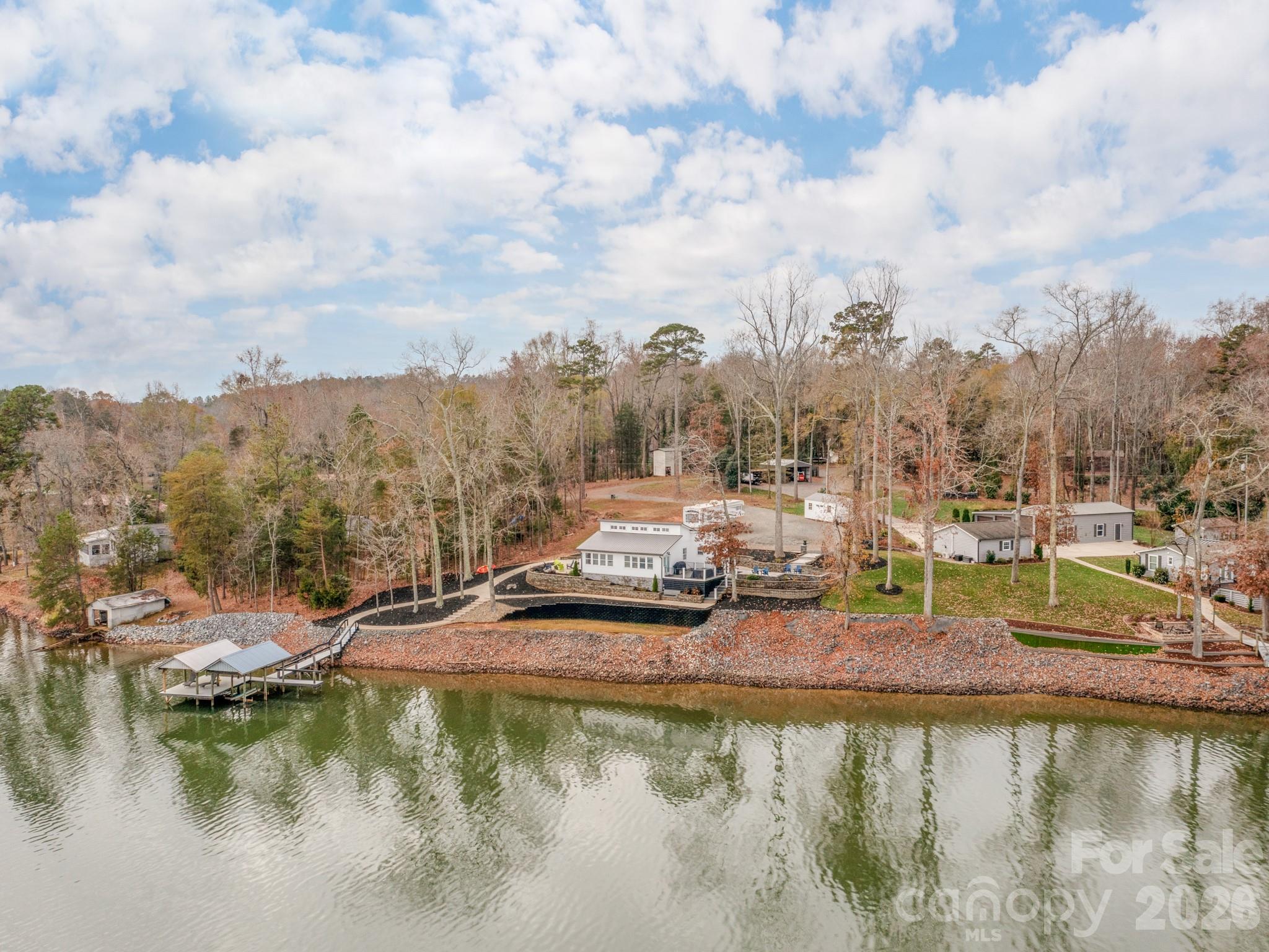 6788 Bucleigh Road Lake Wylie, SC 29710 - Photo 42 of 45 a view of a lake with houses