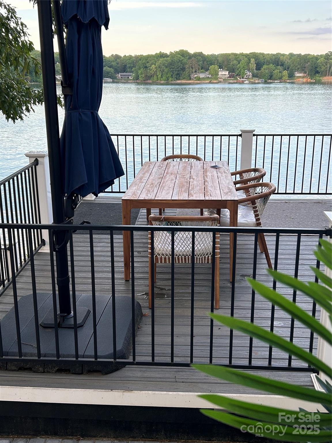 6788 Bucleigh Road Lake Wylie, SC 29710 - Photo 7 of 45 a view of a wooden roof deck