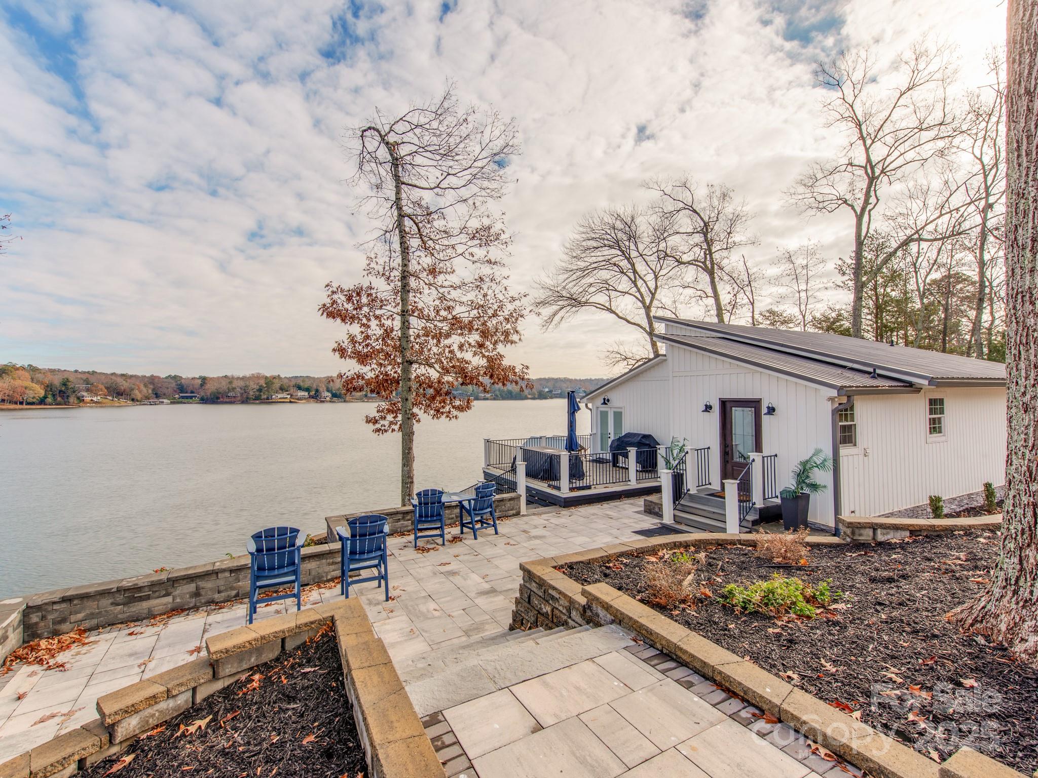 6788 Bucleigh Road Lake Wylie, SC 29710 - Photo 8 of 45 a view of a backyard with sitting area