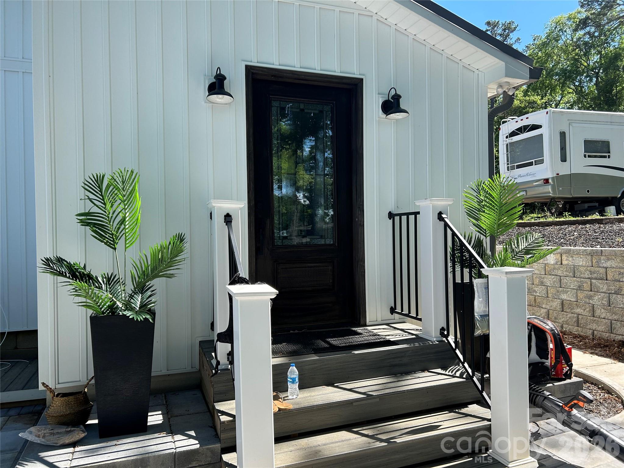 6788 Bucleigh Road Lake Wylie, SC 29710 - Photo 9 of 45 a view of a entryway door of the house