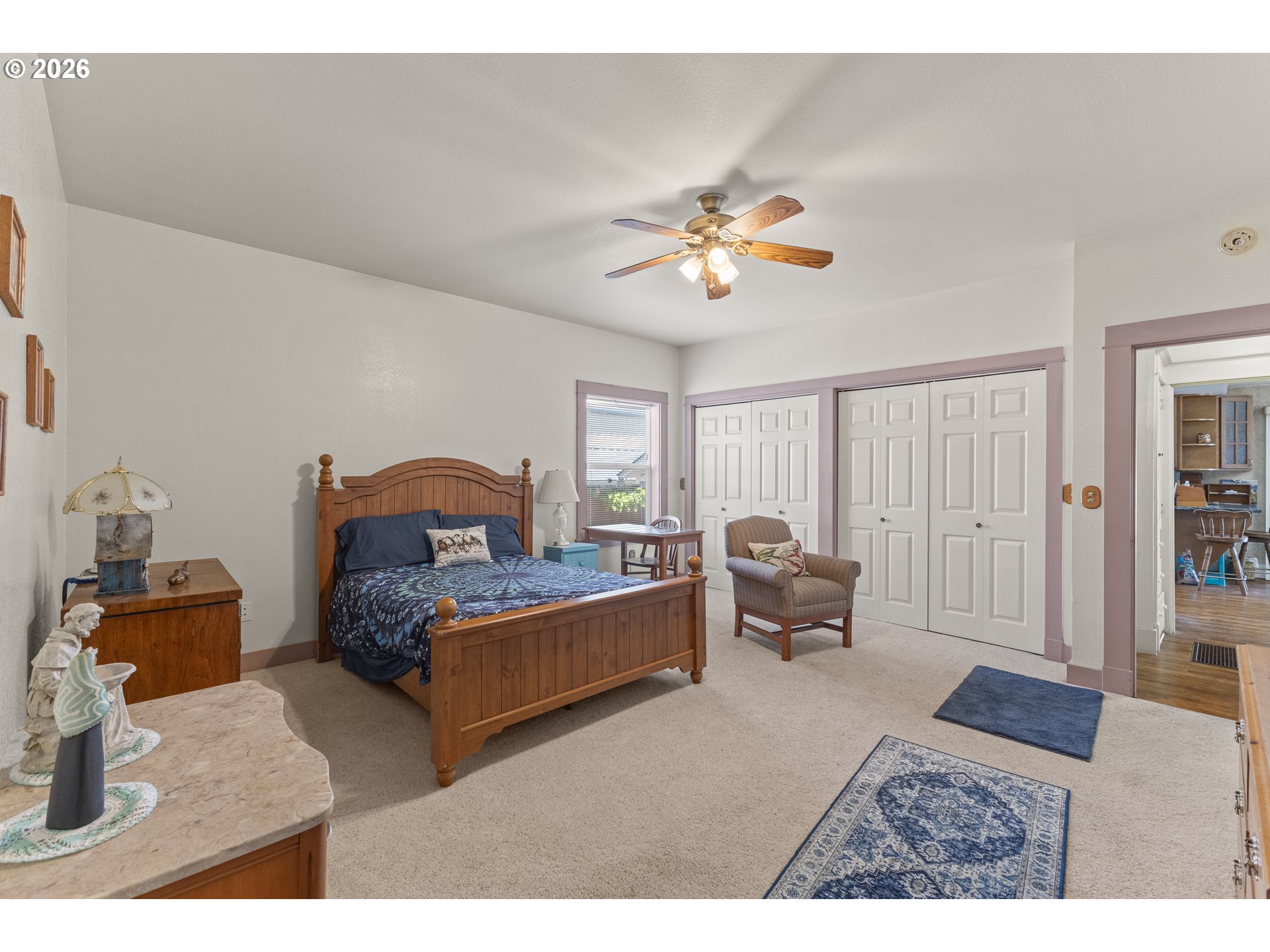208 7th Street Myrtle Point, OR 97458 - Photo 26 of 48 a living room with furniture and a chandelier