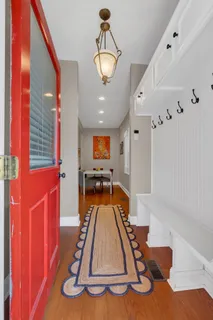 a room with furniture and wooden floor