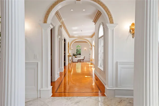 a view of a living room with a fireplace
