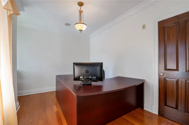 a view of workspace with wooden floor