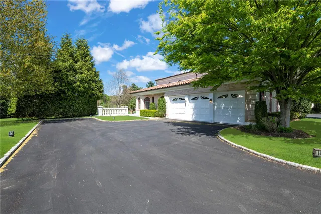 a view of house with outdoor space and street view