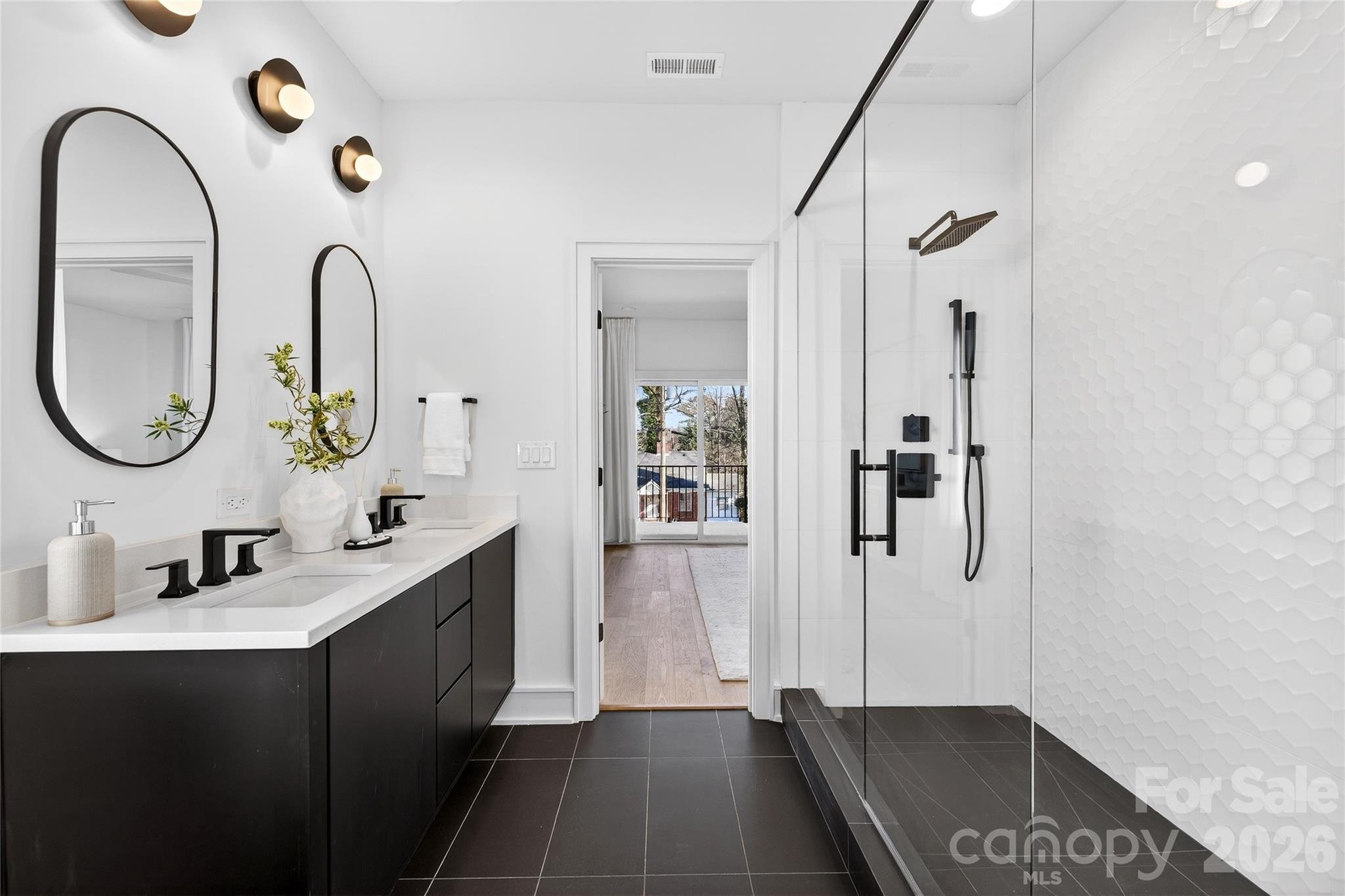 2713 Ruby Street Charlotte, NC 28208 - Photo 22 of 31 a bathroom with a sink and a mirror