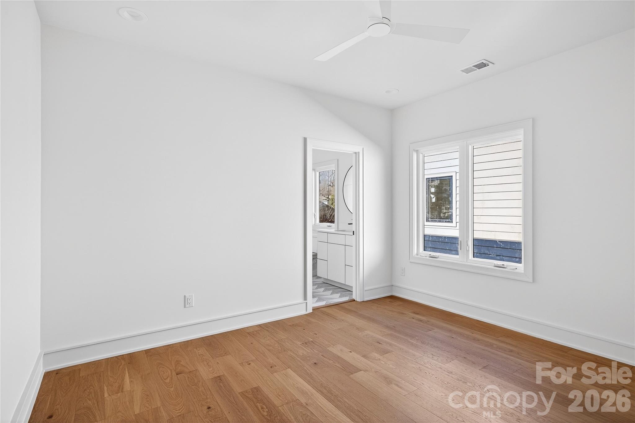 2713 Ruby Street Charlotte, NC 28208 - Photo 29 of 31 an empty room with a window