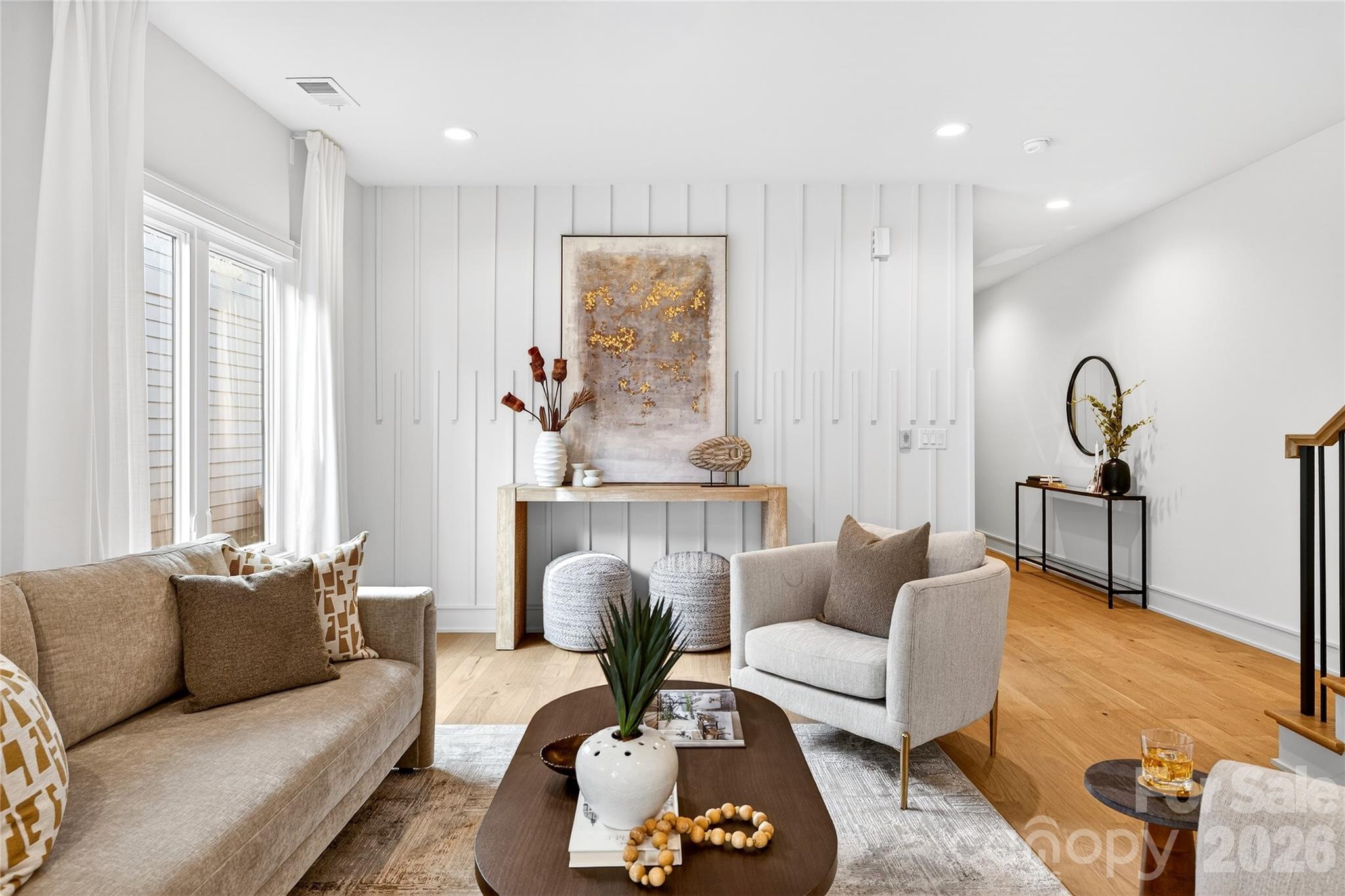 2713 Ruby Street Charlotte, NC 28208 - Photo 8 of 31 a living room with furniture and a large window