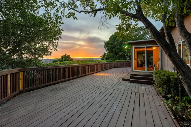 a view of outdoor space with wooden deck