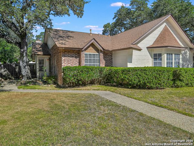 9519 Coolbrook San Antonio, TX 78250 - Photo 1 of 1 a view of a house with a yard and plants