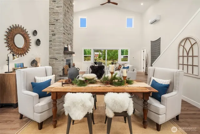 a view of a dining room with furniture window and outside view