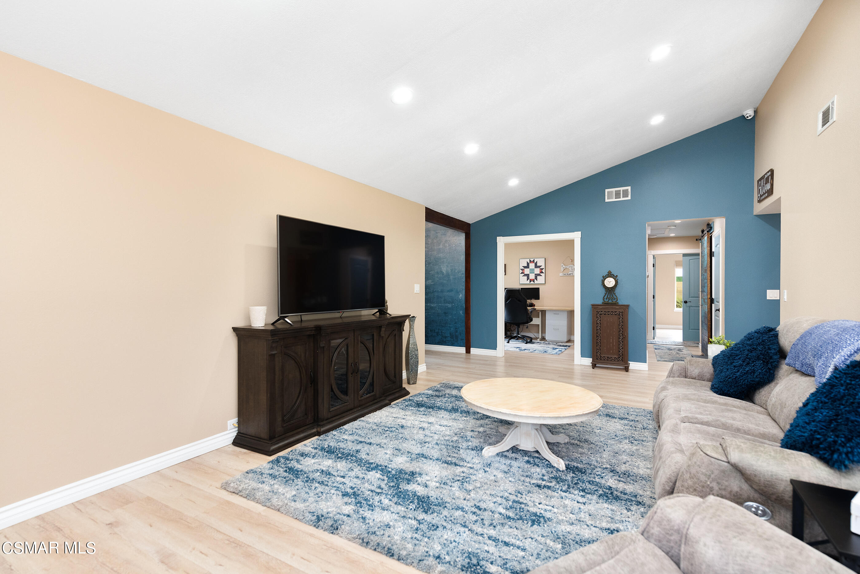 852 Weaver Street Simi Valley, CA 93065 - Photo 12 of 45 a living room with furniture and a flat screen tv