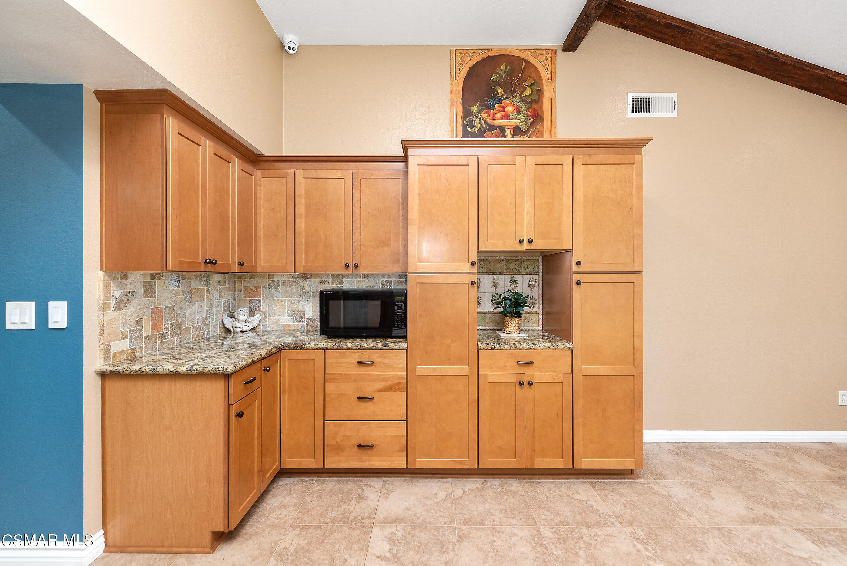 852 Weaver Street Simi Valley, CA 93065 - Photo 23 of 45 a kitchen with stainless steel appliances a stove refrigerator and cabinets