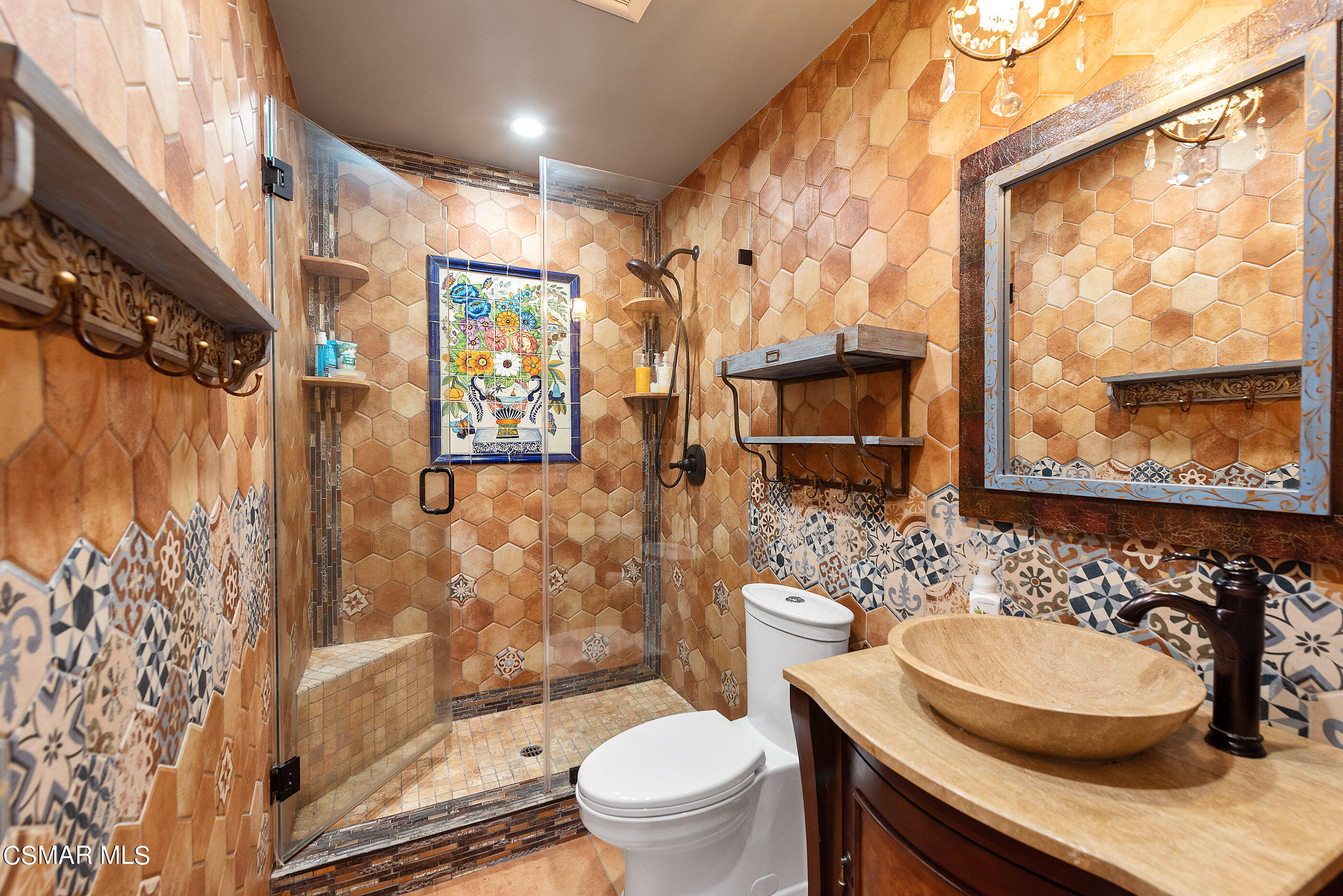 852 Weaver Street Simi Valley, CA 93065 - Photo 25 of 45 a bathroom with a toilet sink and mirror