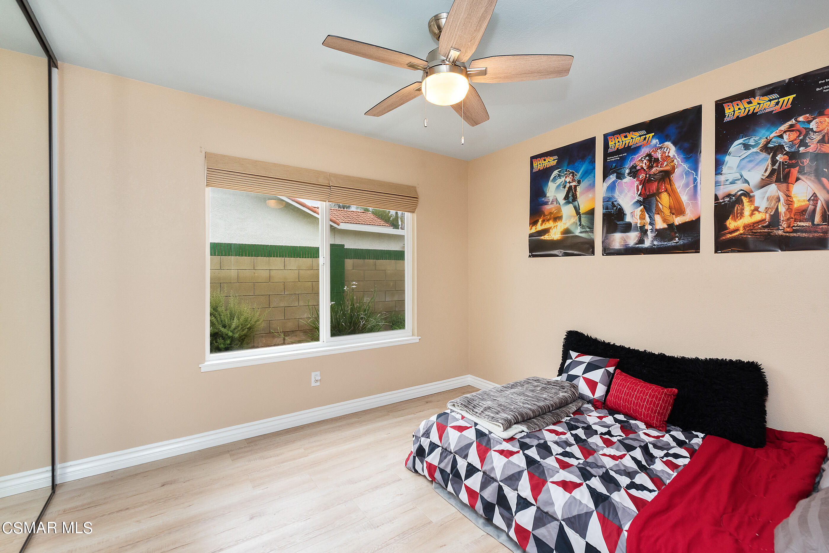 852 Weaver Street Simi Valley, CA 93065 - Photo 26 of 45 a bedroom with a bed and a painting on the wall
