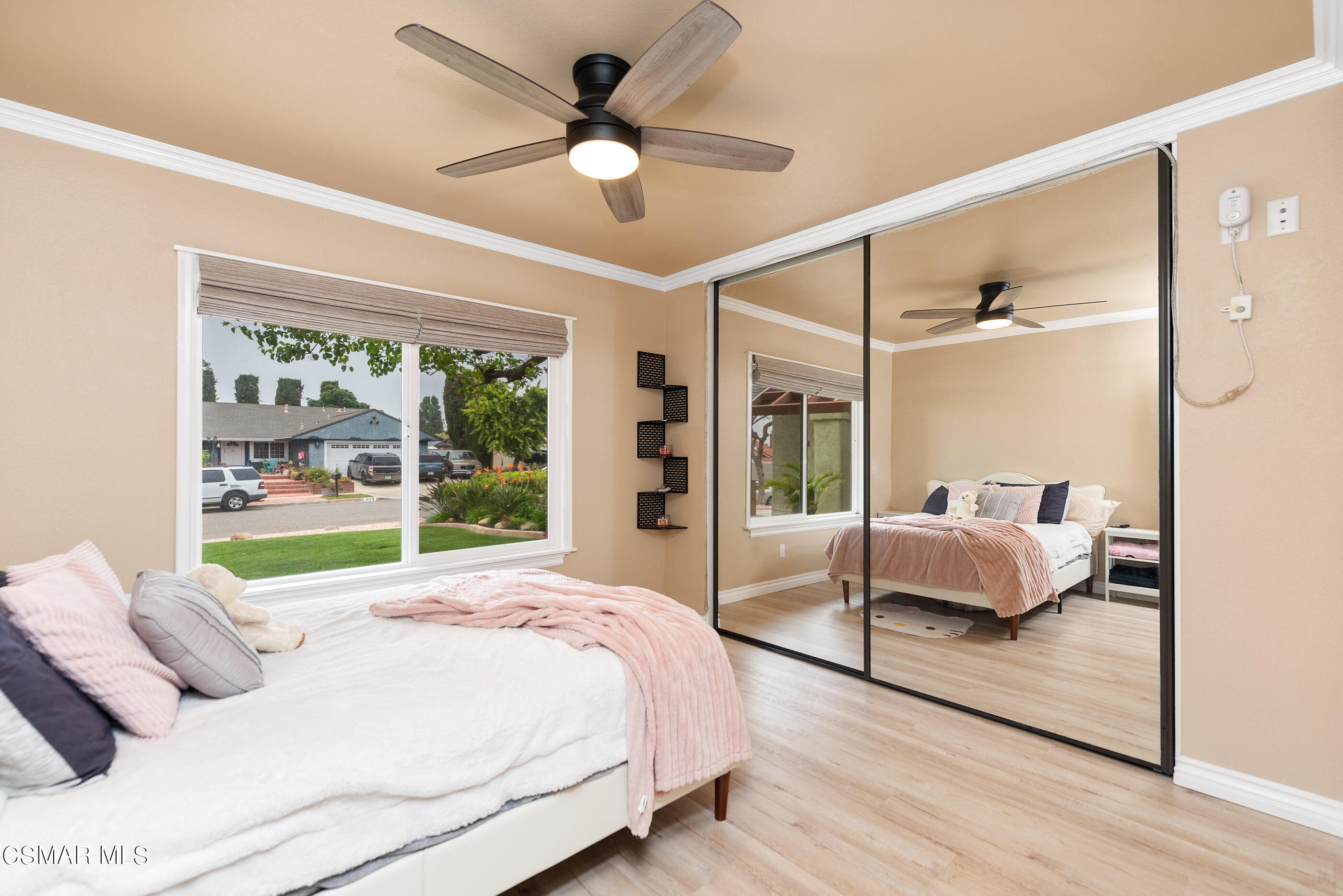 852 Weaver Street Simi Valley, CA 93065 - Photo 27 of 45 a bedroom with a bed and wooden floor