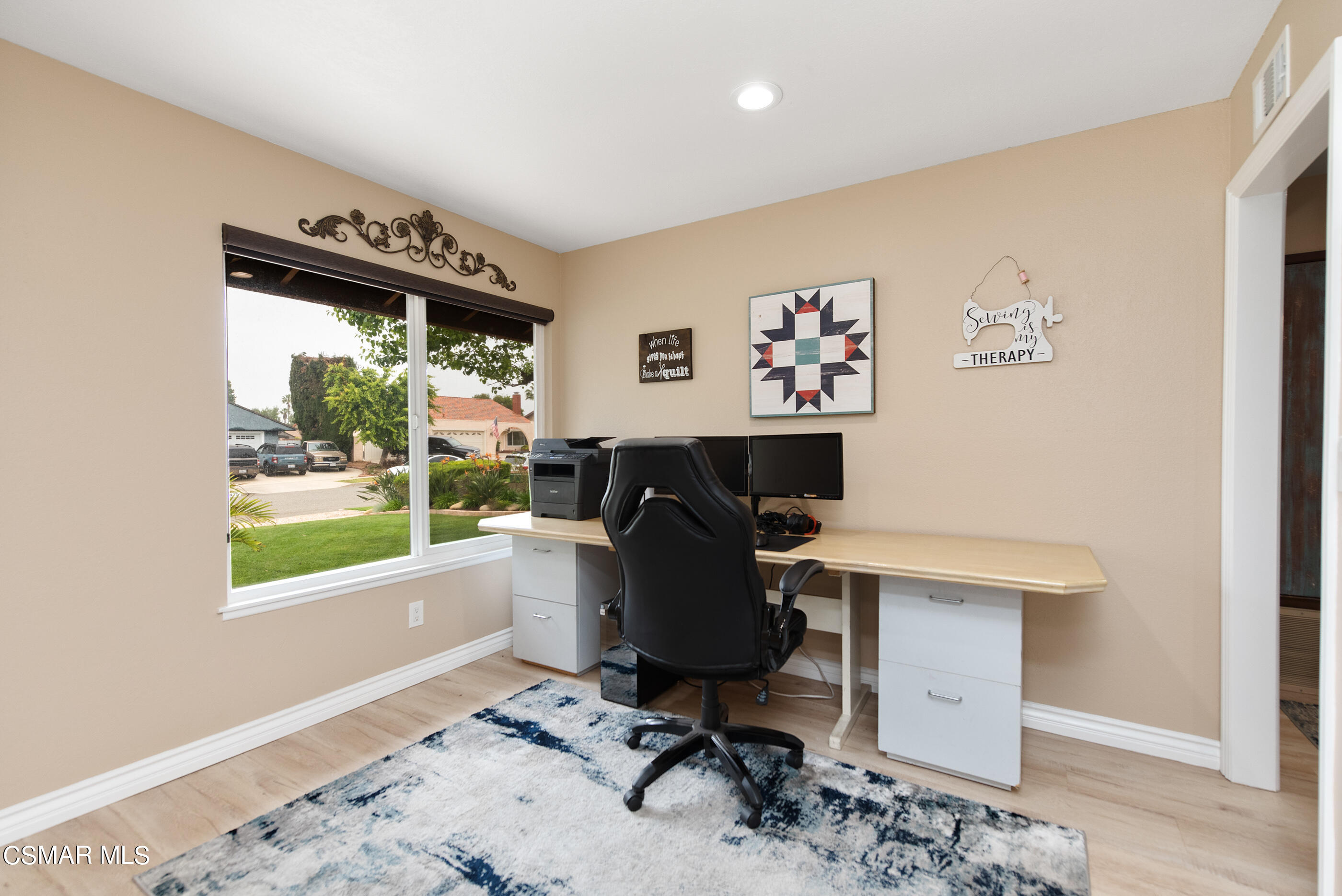 852 Weaver Street Simi Valley, CA 93065 - Photo 29 of 45 a view of a workspace with furniture and a window