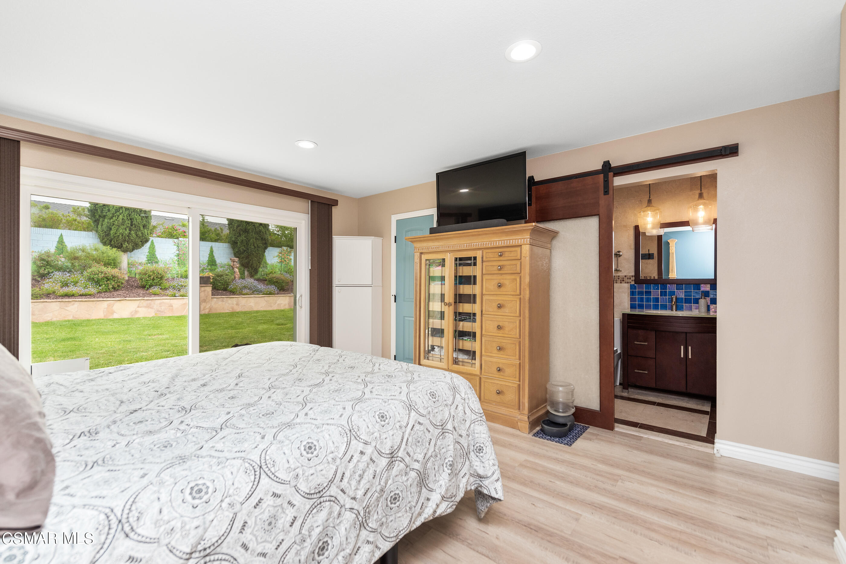 852 Weaver Street Simi Valley, CA 93065 - Photo 31 of 45 a bedroom with a bed and a large window