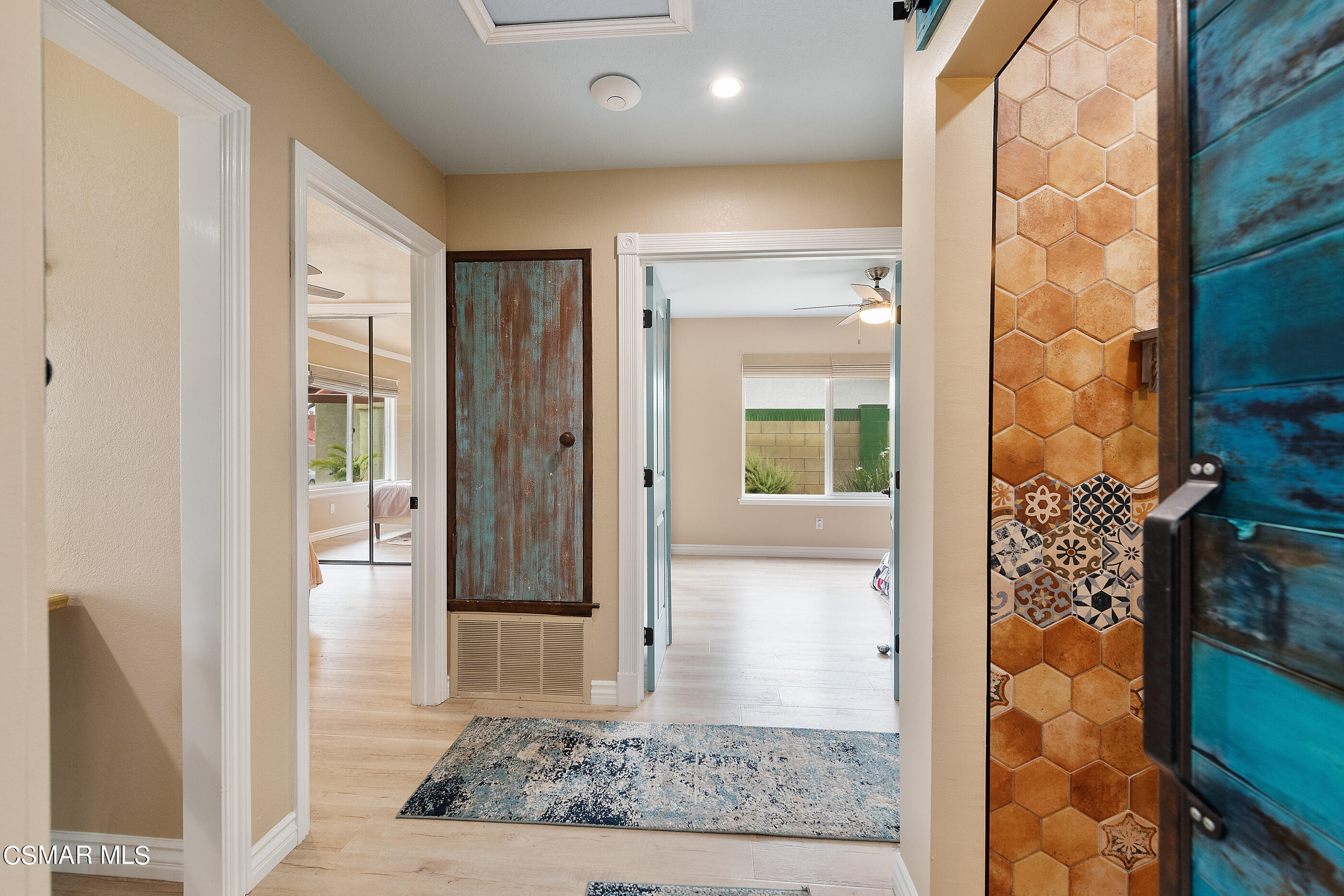 852 Weaver Street Simi Valley, CA 93065 - Photo 34 of 45 hallway with wooden floor and glass door