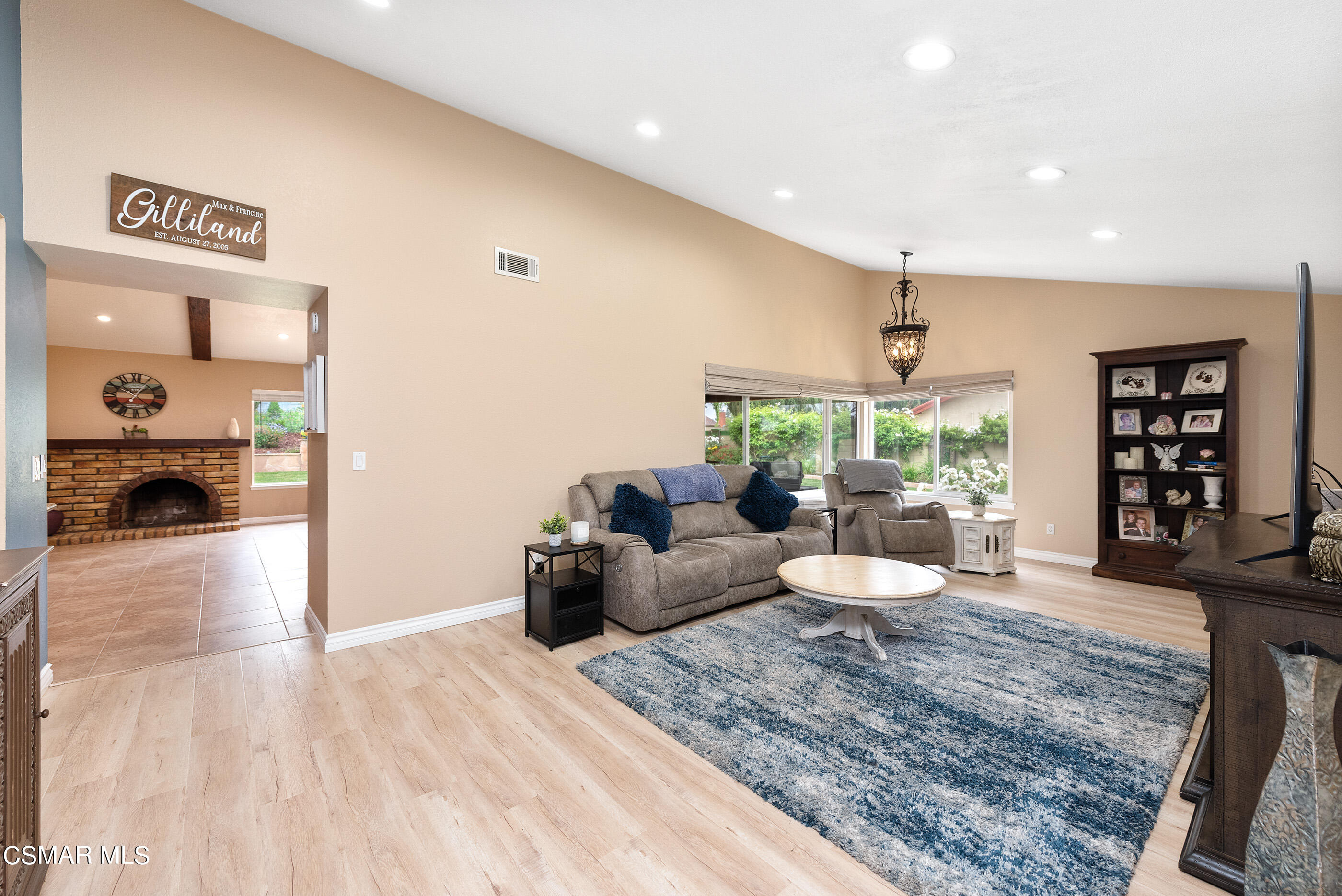 852 Weaver Street Simi Valley, CA 93065 - Photo 8 of 45 a living room with furniture and a wooden floor