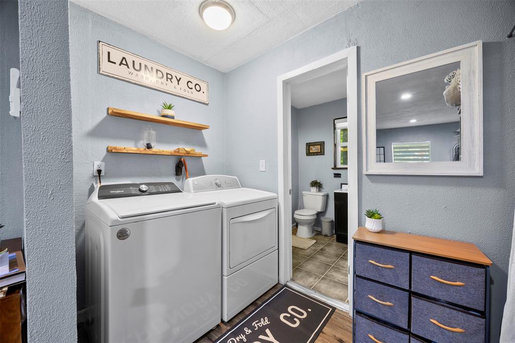 7110 Apache Circle Mabank, TX 75156 - Photo 15 of 40 a utility room with dryer and washer