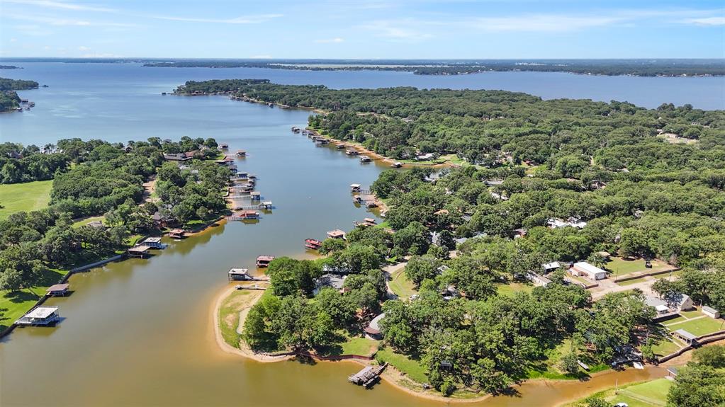 7110 Apache Circle Mabank, TX 75156 - Photo 2 of 40 an aerial view of valley and lake