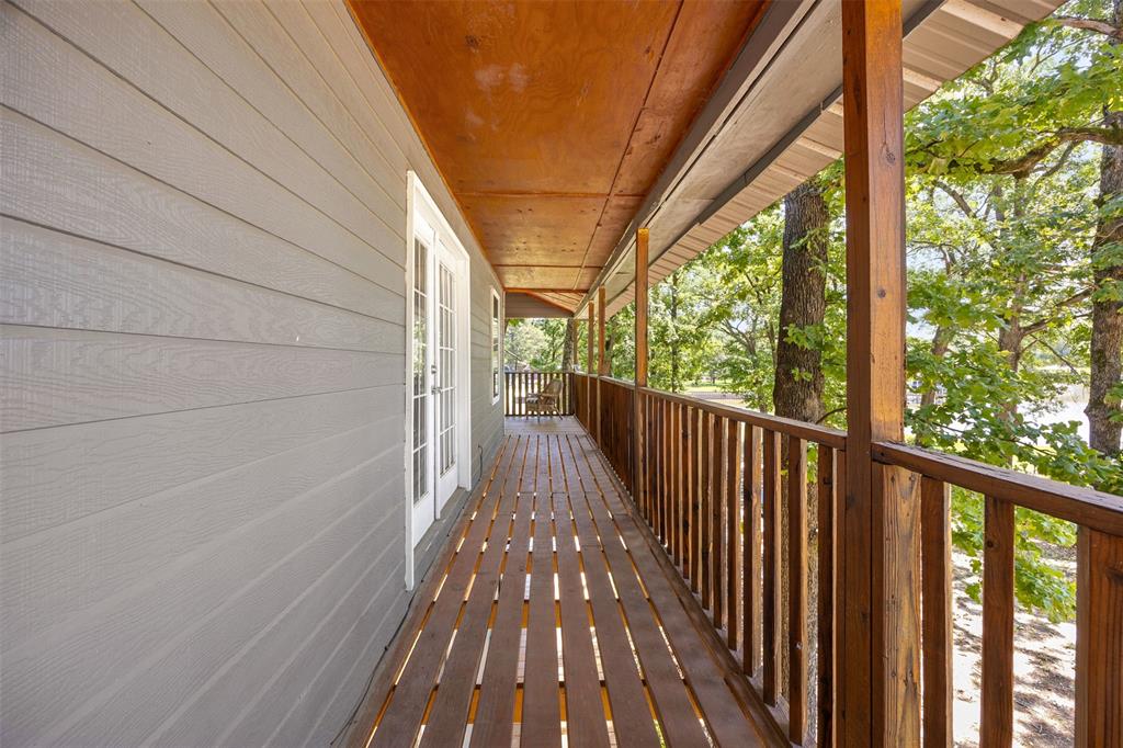 7110 Apache Circle Mabank, TX 75156 - Photo 28 of 40 a view of balcony with wooden floor
