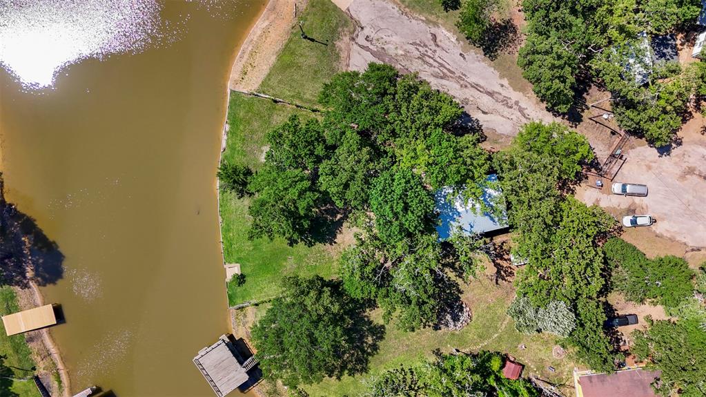 7110 Apache Circle Mabank, TX 75156 - Photo 32 of 40 an aerial view of a house with a yard