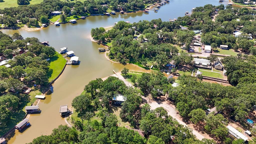 7110 Apache Circle Mabank, TX 75156 - Photo 35 of 40 an aerial view of lake residential house with outdoor space and trees all around